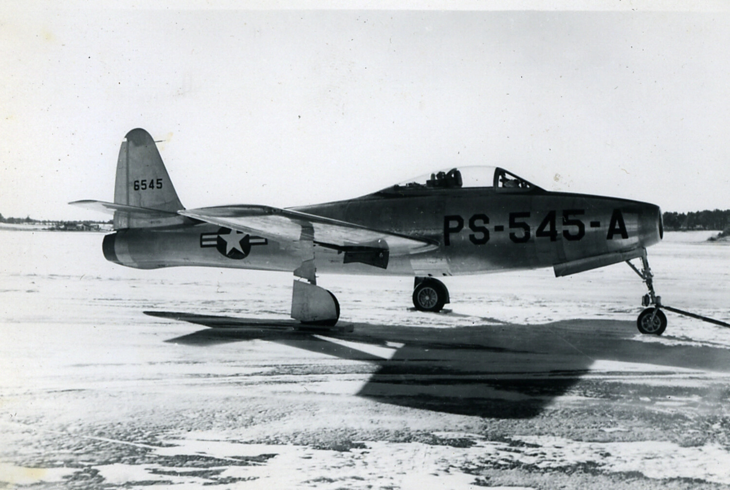Republic F-84 Thunderjet 'PS-545-A' on Snow-Covered Airfield Ramp, Japan, Early 1950s