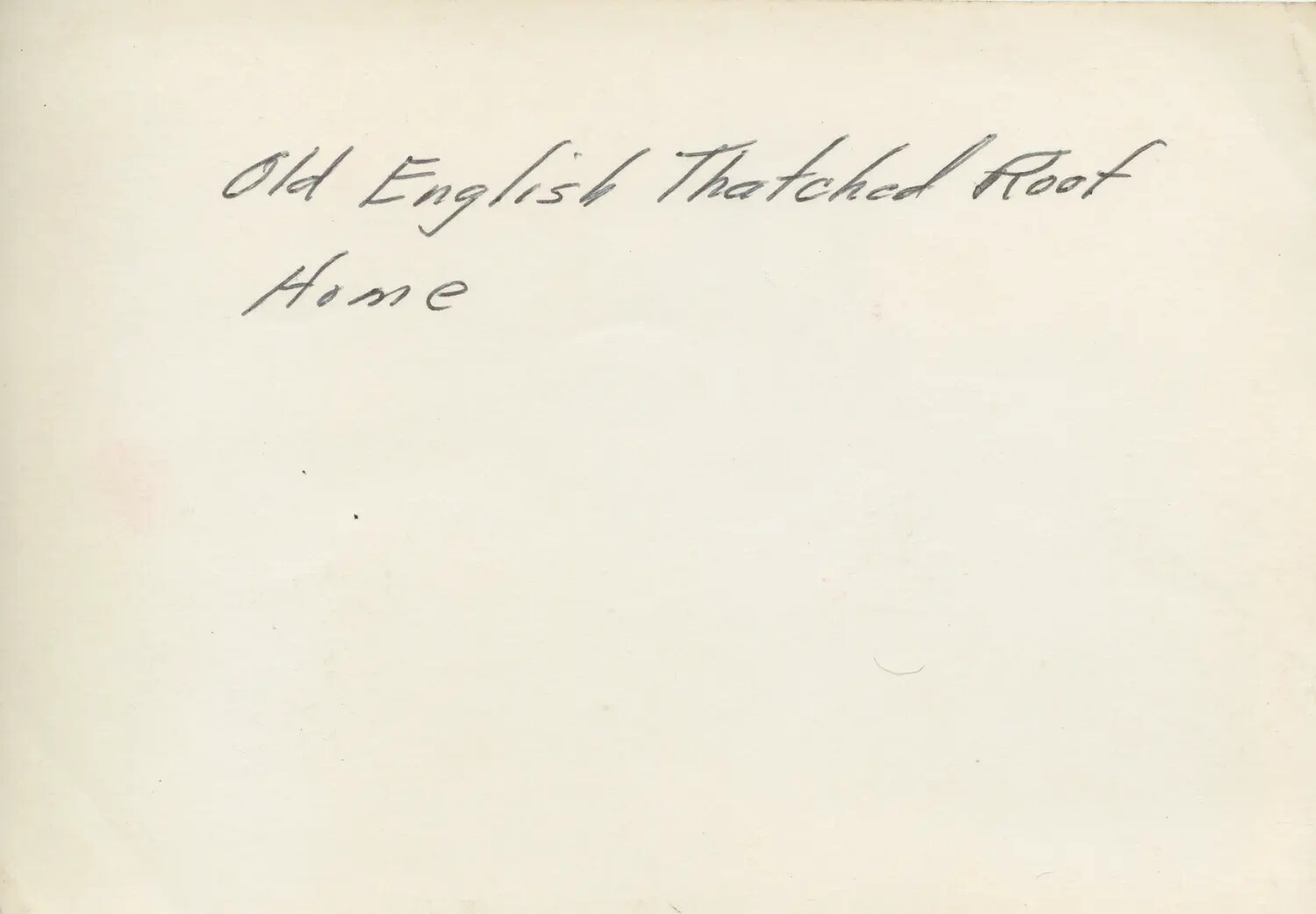 Verso Caption: "Old English Thatched Roof Home"