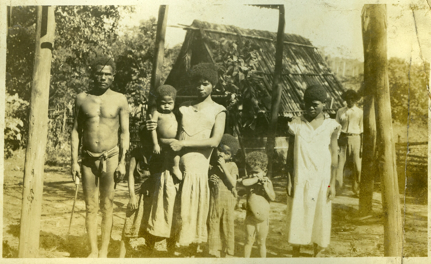 Aeta Family Group Before a Thatched Dwelling, Manila Photo Album