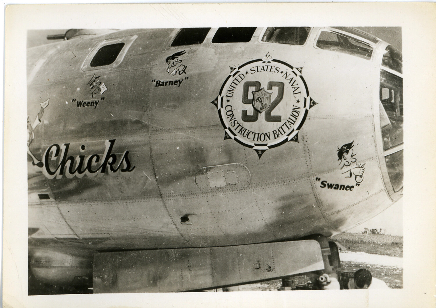 B-29 Superfortress "Chicks" with United States Naval Construction Battalion 92 Insignia and Crew Nicknames, World War II