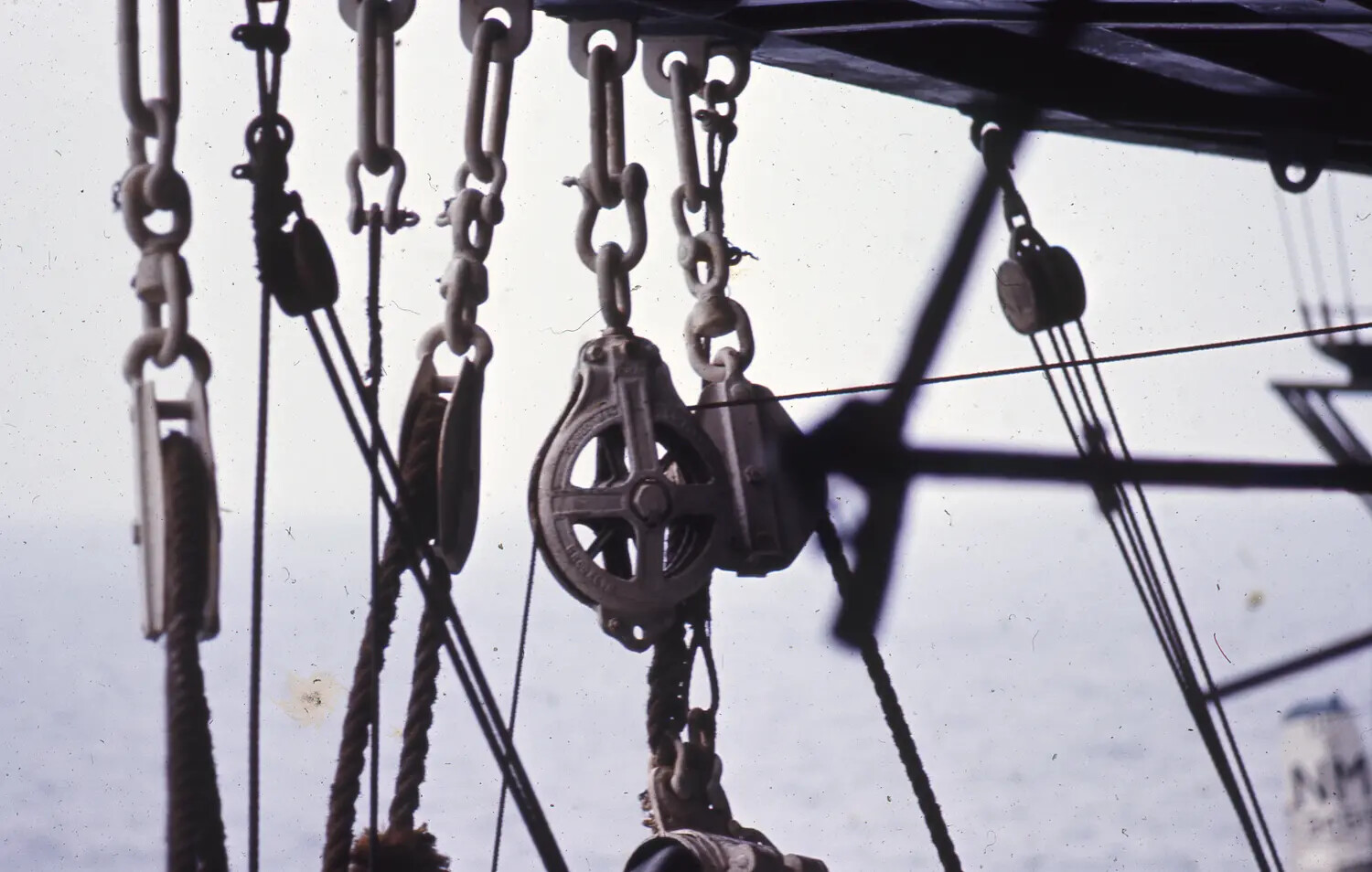 Shipboard Rigging Detail: Blocks, Chains, and Falls Aboard a Vietnam-Era Aircraft Carrier