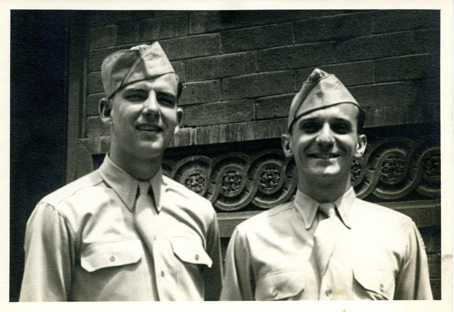 Two Airmen in Garrison Caps Before Ornate Stone Building — 345th Bomb Group Album
