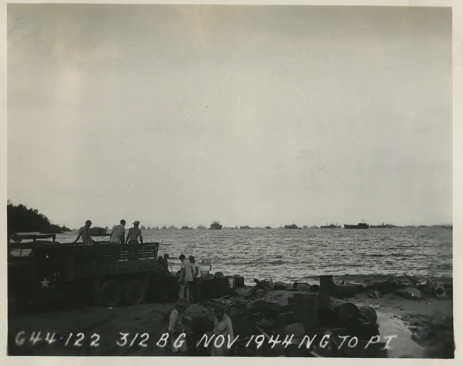 312th Bombardment Group Convoy Staging on Beach, New Guinea to Philippines, November 1944