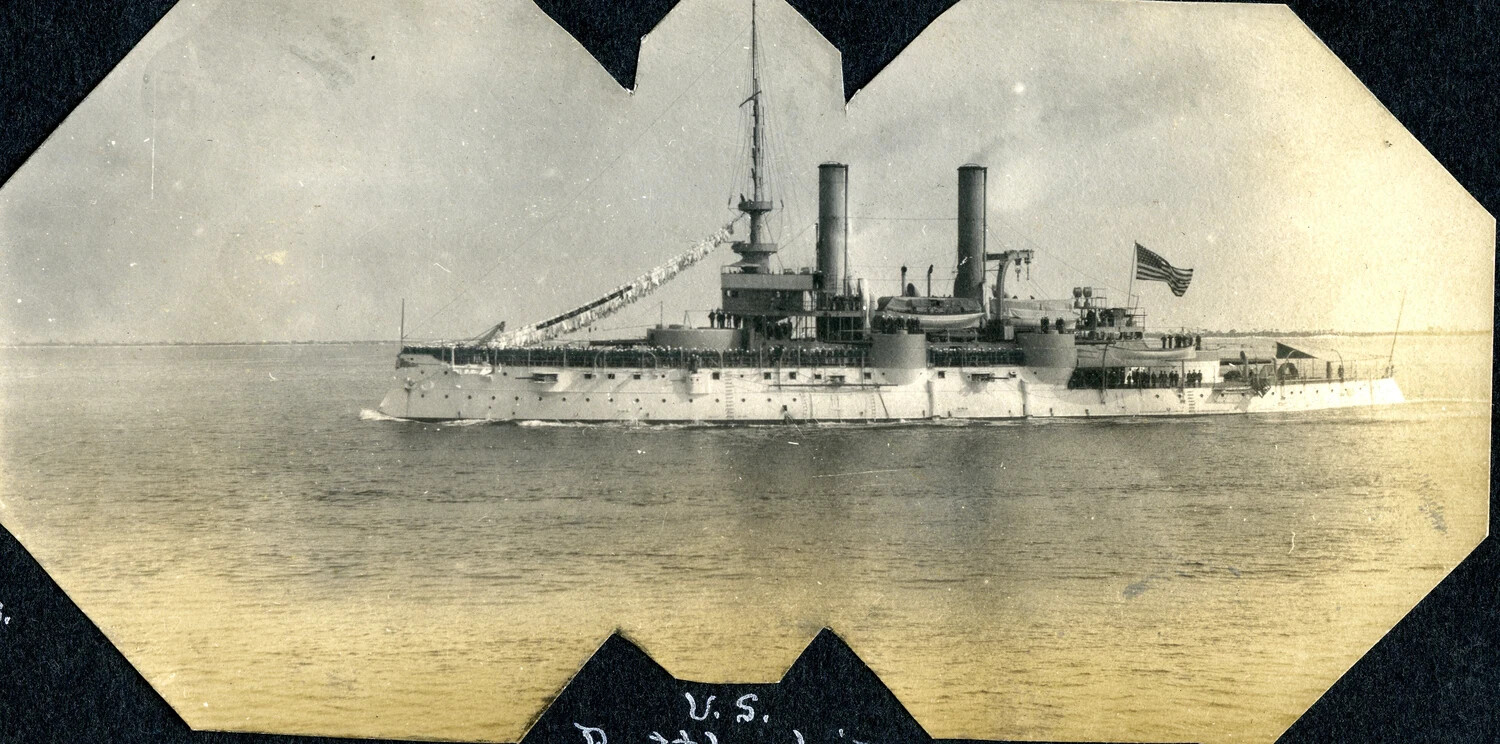U.S. Navy Warship at Sea with Crew Manning the Rail, Early 20th Century — USS Columbia Album