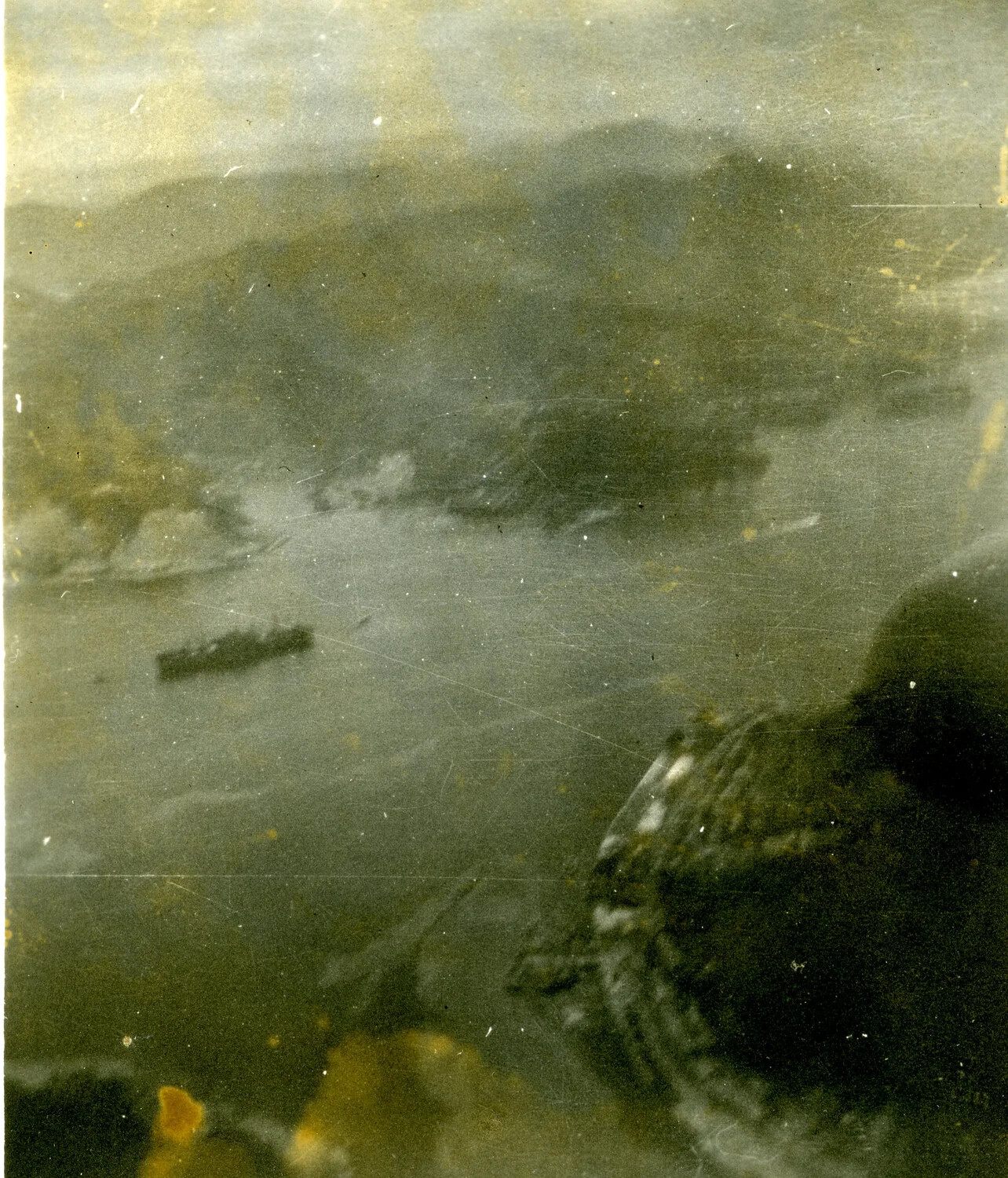 Low-Level Aerial Strike Photograph of Coastal Shipping, Pacific Theater, 1945