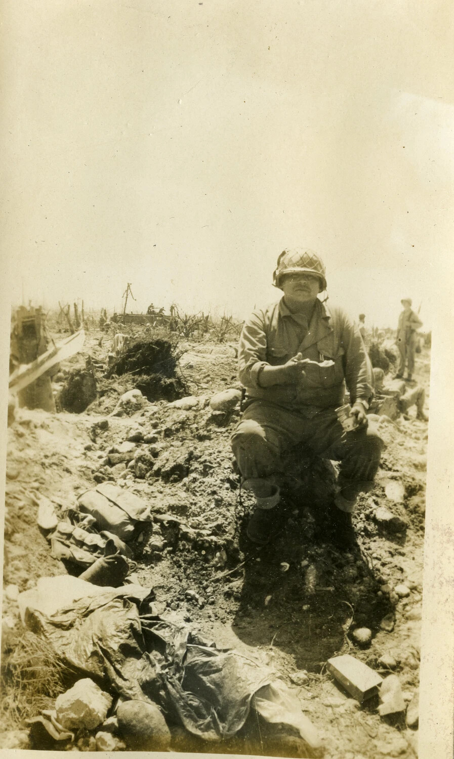 U.S. Serviceman Amid Battle Debris on Kwajalein Atoll, 1944