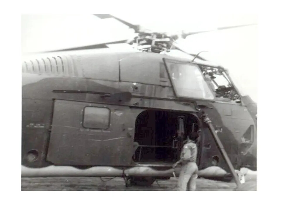 Sikorsky H-3 Series Helicopter with Crew Member at Cargo Door
