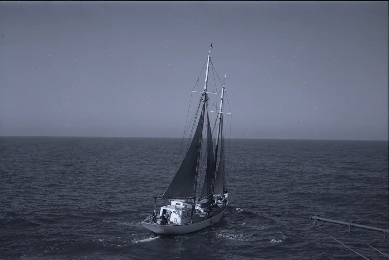 Harbor Pilot Boat Under Sail, Photographed from USS Petrof Bay (CVE-80), WWII Era