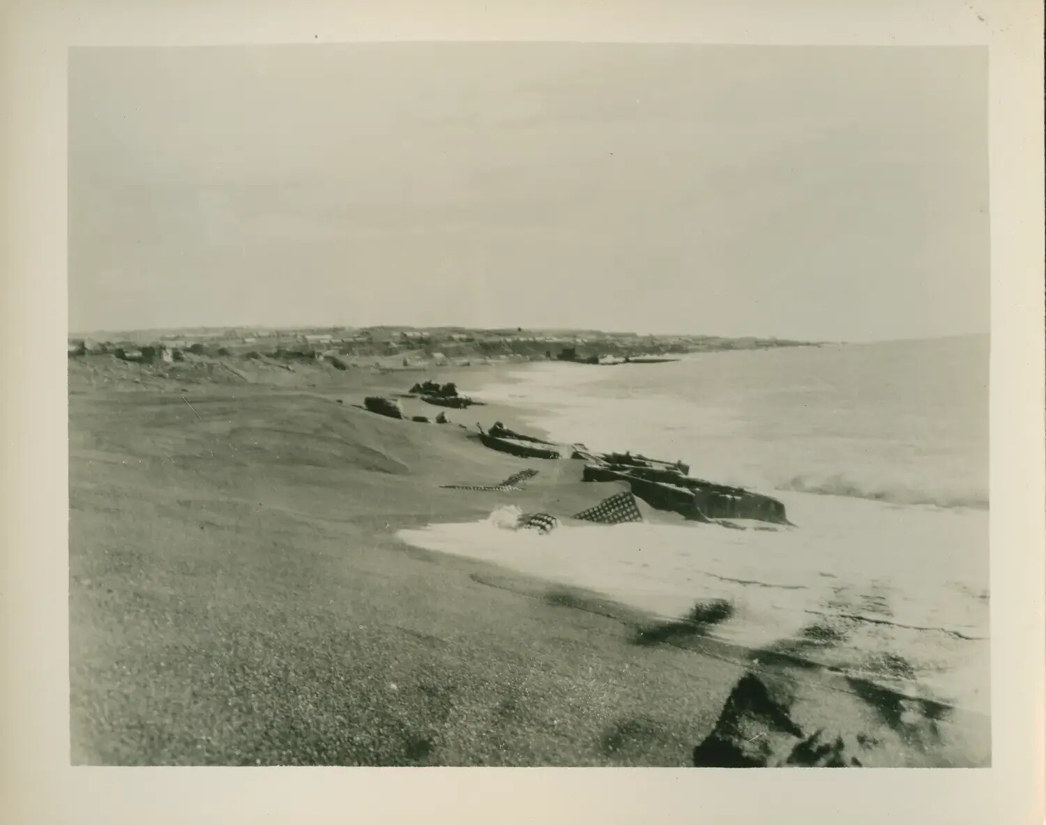 Invasion Beach with Camouflaged Landing Craft, USS Petrof Bay (CVE-80) Collection
