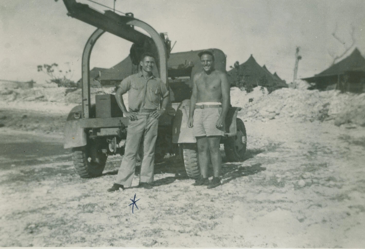 Two Servicemen with Construction Equipment at Pacific Island Base, WWII