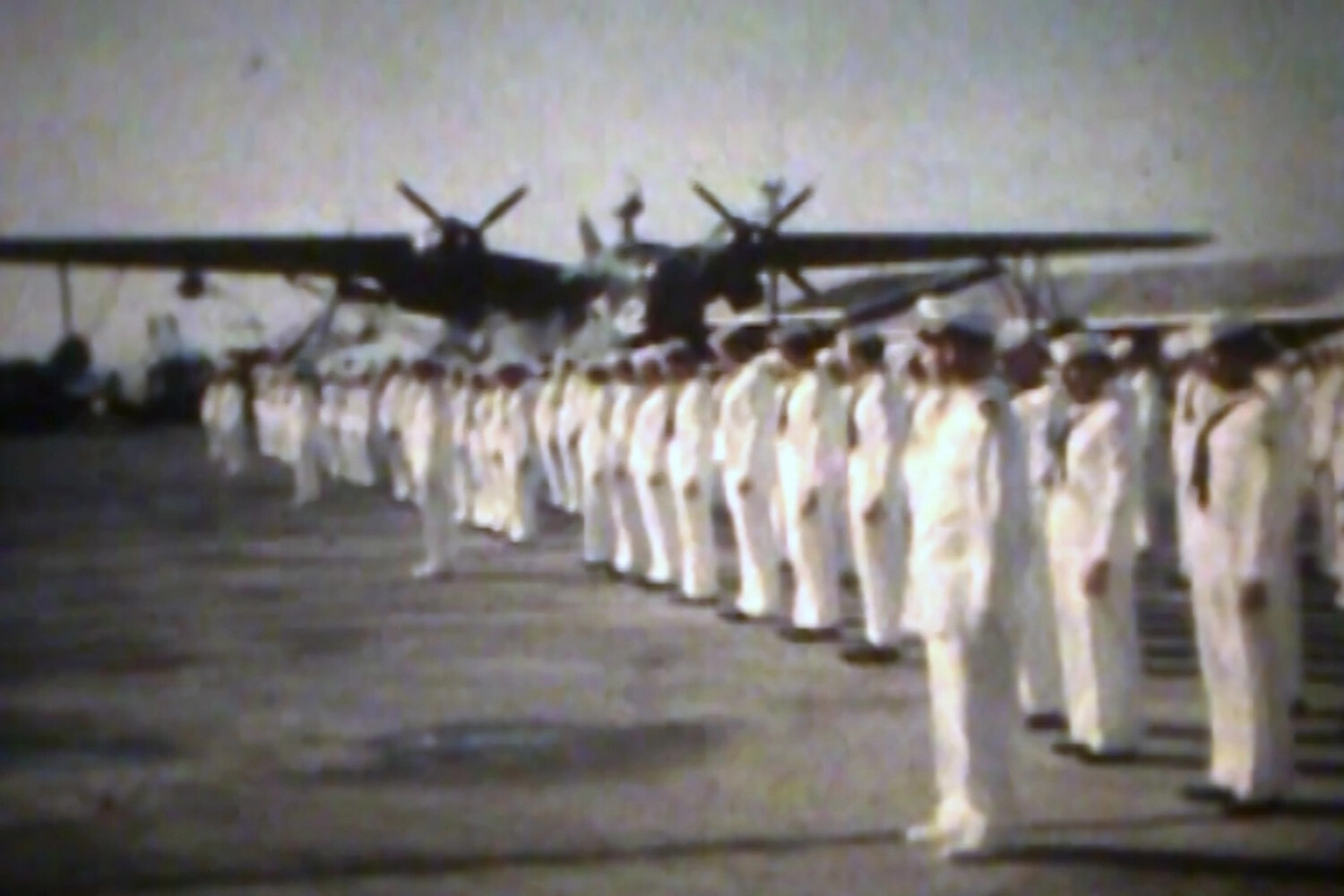 Sailors in Formation Before PBM Mariner Seaplane, NAS Kaneohe Bay
