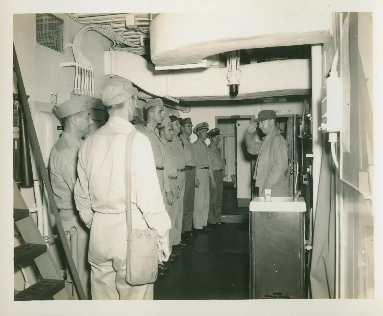 Sailors Standing at Attention in Passageway Aboard USS Petrof Bay (CVE-80)