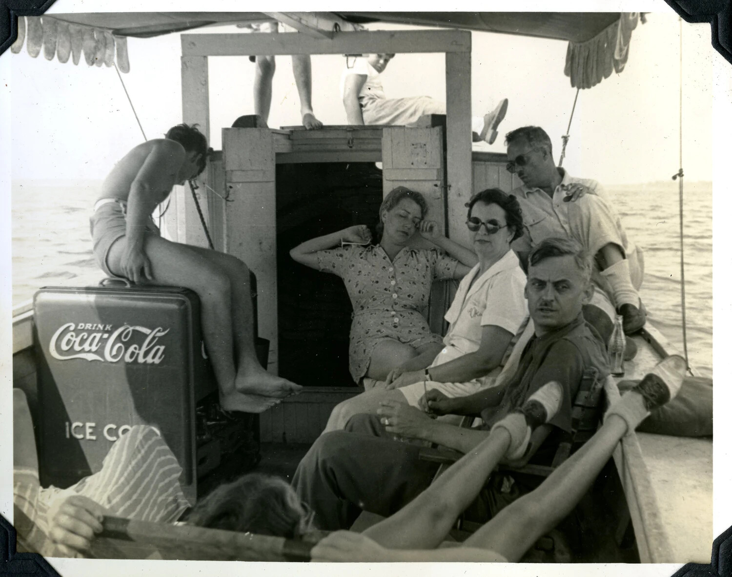 Family and Friends Aboard a Pleasure Boat with Coca-Cola Cooler, Mid-20th Century