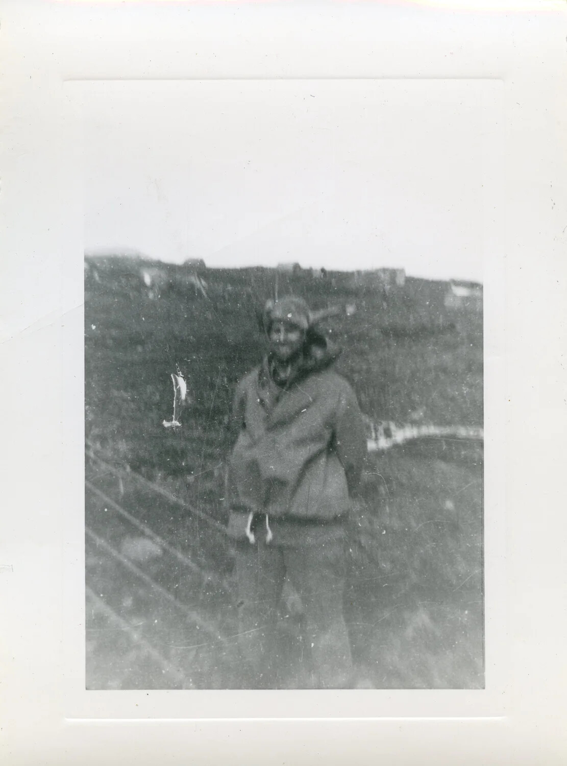 Serviceman on Windswept Hillside Overlooking Camp, Aleutian Islands, World War II