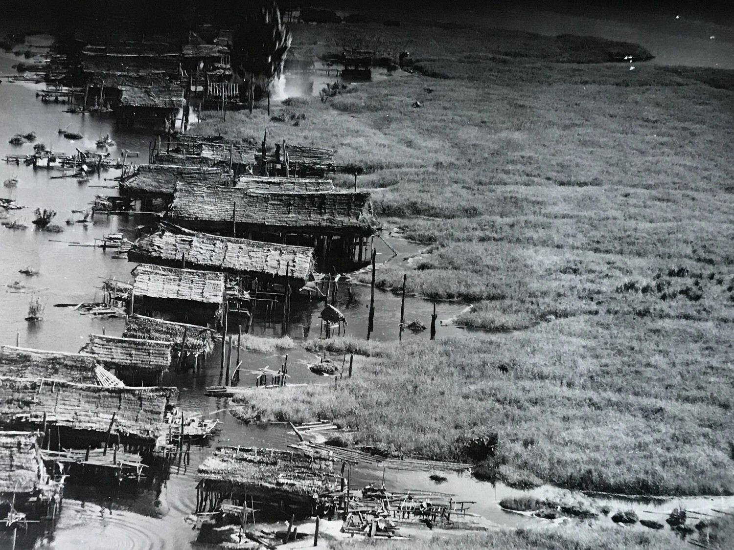 Close Aerial View of Sepik River Village Longhouses, New Guinea