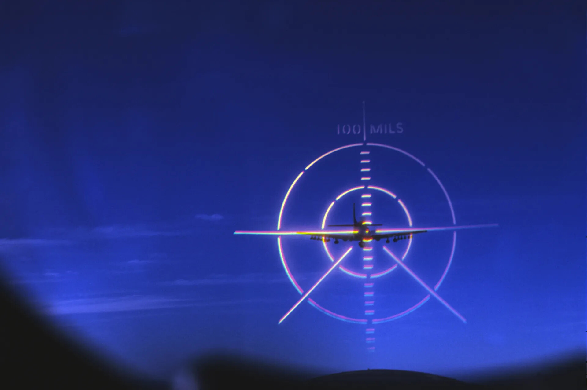 Gunsight/Tracking Reticle View of Aircraft in Flight — Training Slide