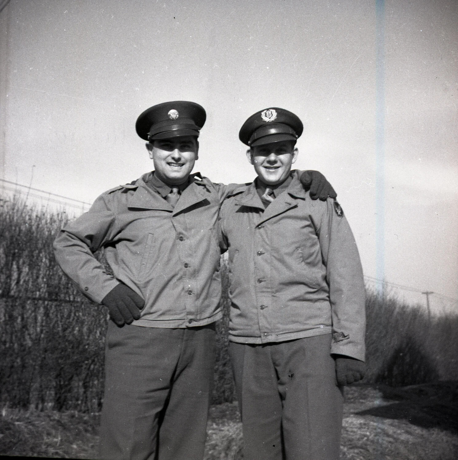 Two Servicemen in Dress Uniform, Arm in Arm, Outdoor Portrait