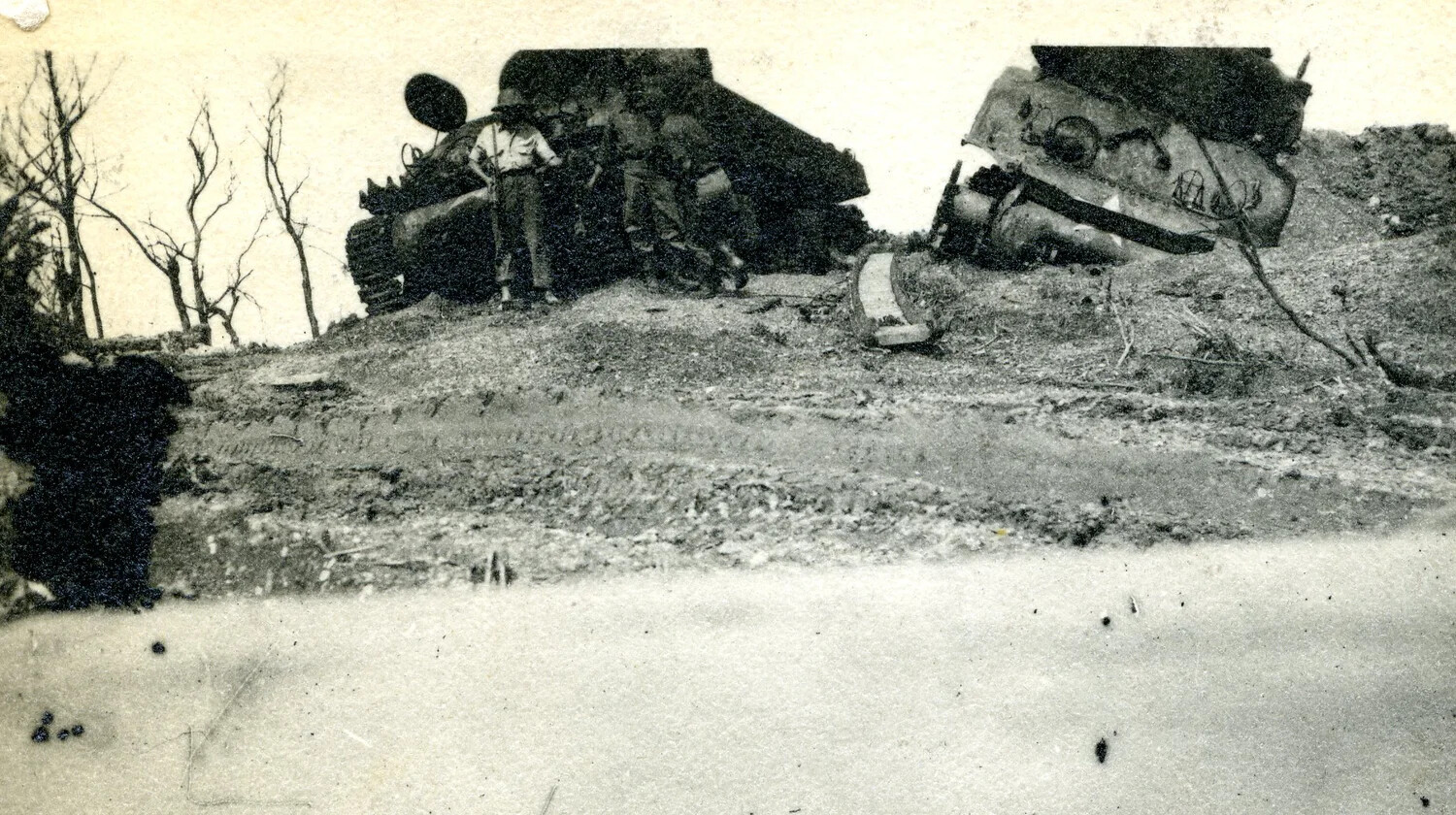 Servicemen Inspecting Wrecked/Overturned Tanks on Battle-Torn Terrain, Ie Shima Area, WWII
