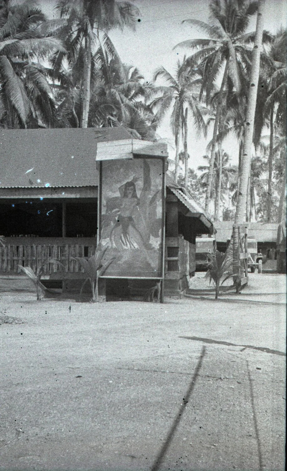 Painted Signboard/Camp Marquee Amid Coconut Palms, Luzon, Philippines, World War II