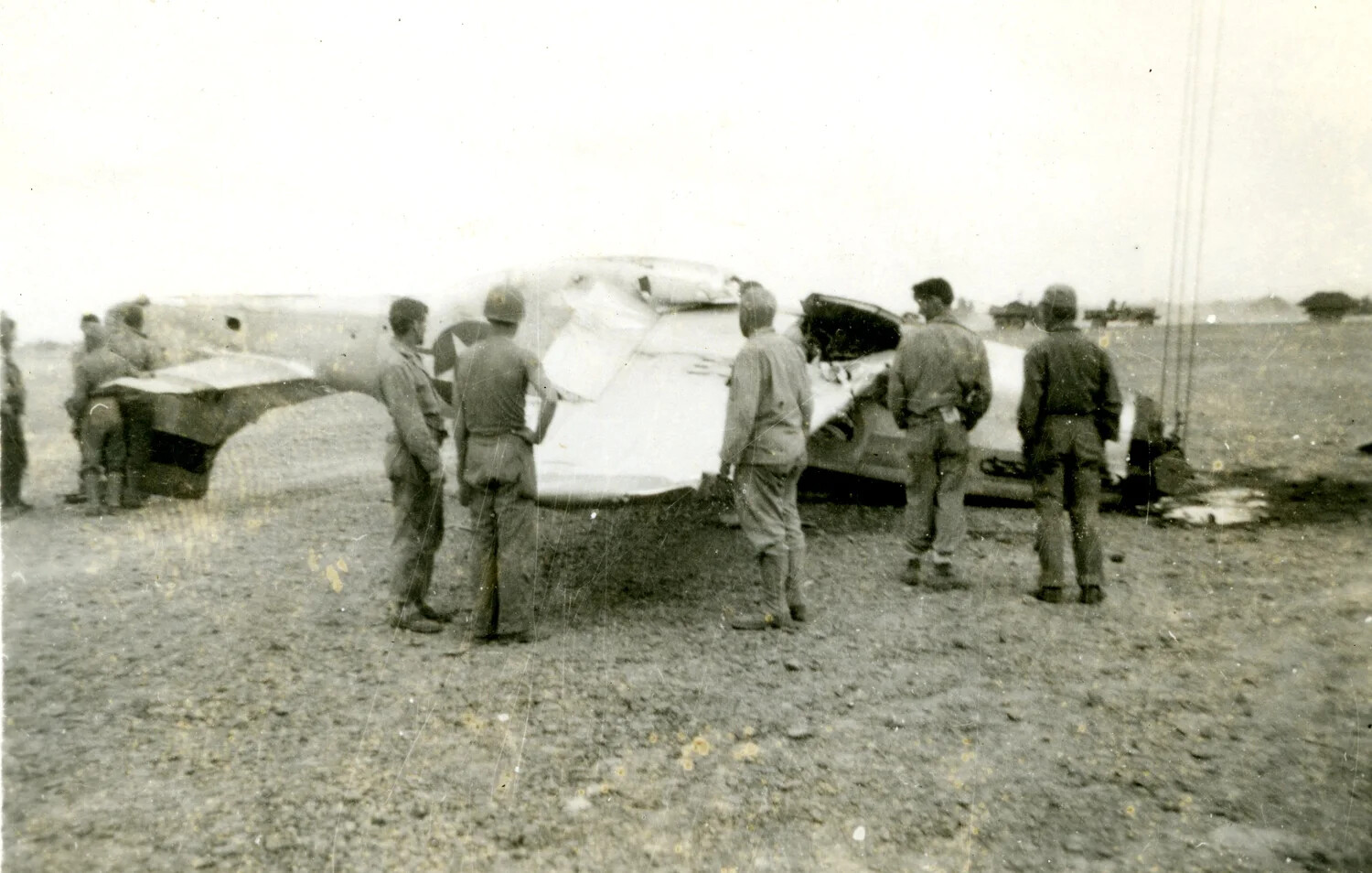 U.S. Servicemen Inspecting Crashed Aircraft on Airfield, Iwo Jima, 1945