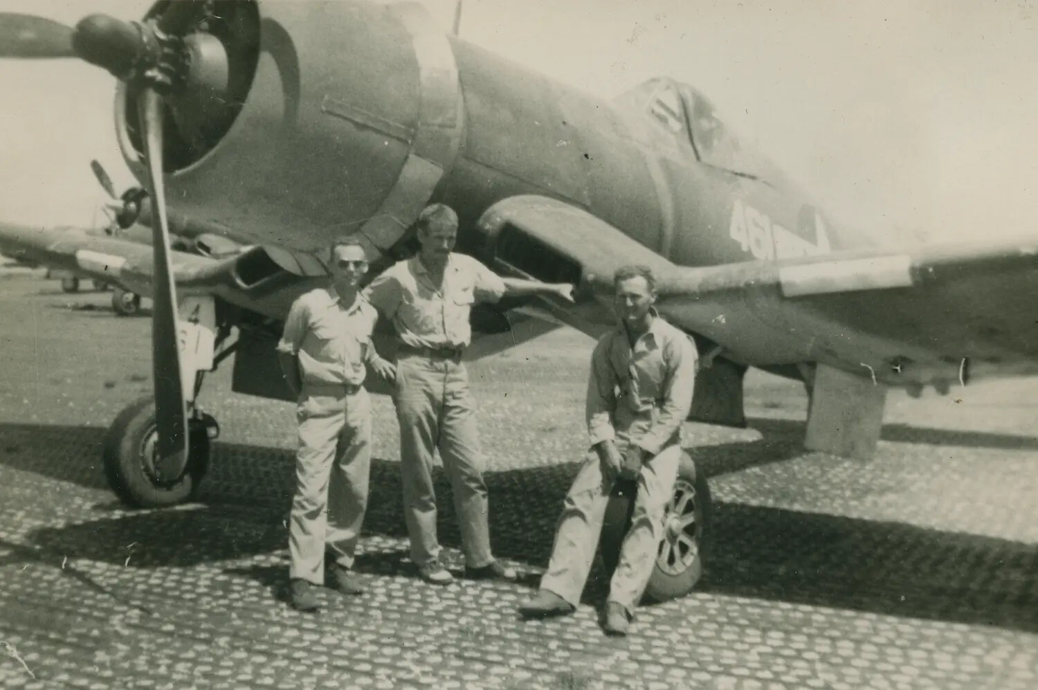 Three Airmen Beside a Radial-Engine Fighter Aircraft, Fuselage Code '461', Pacific Theater (Early WWII)