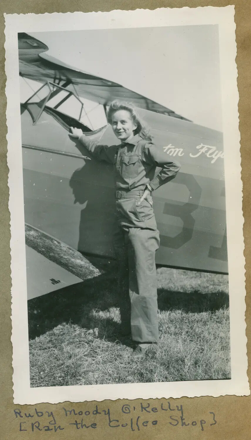 Woman in Coveralls Beside Training Aircraft Wing, Flying School Album Photo
