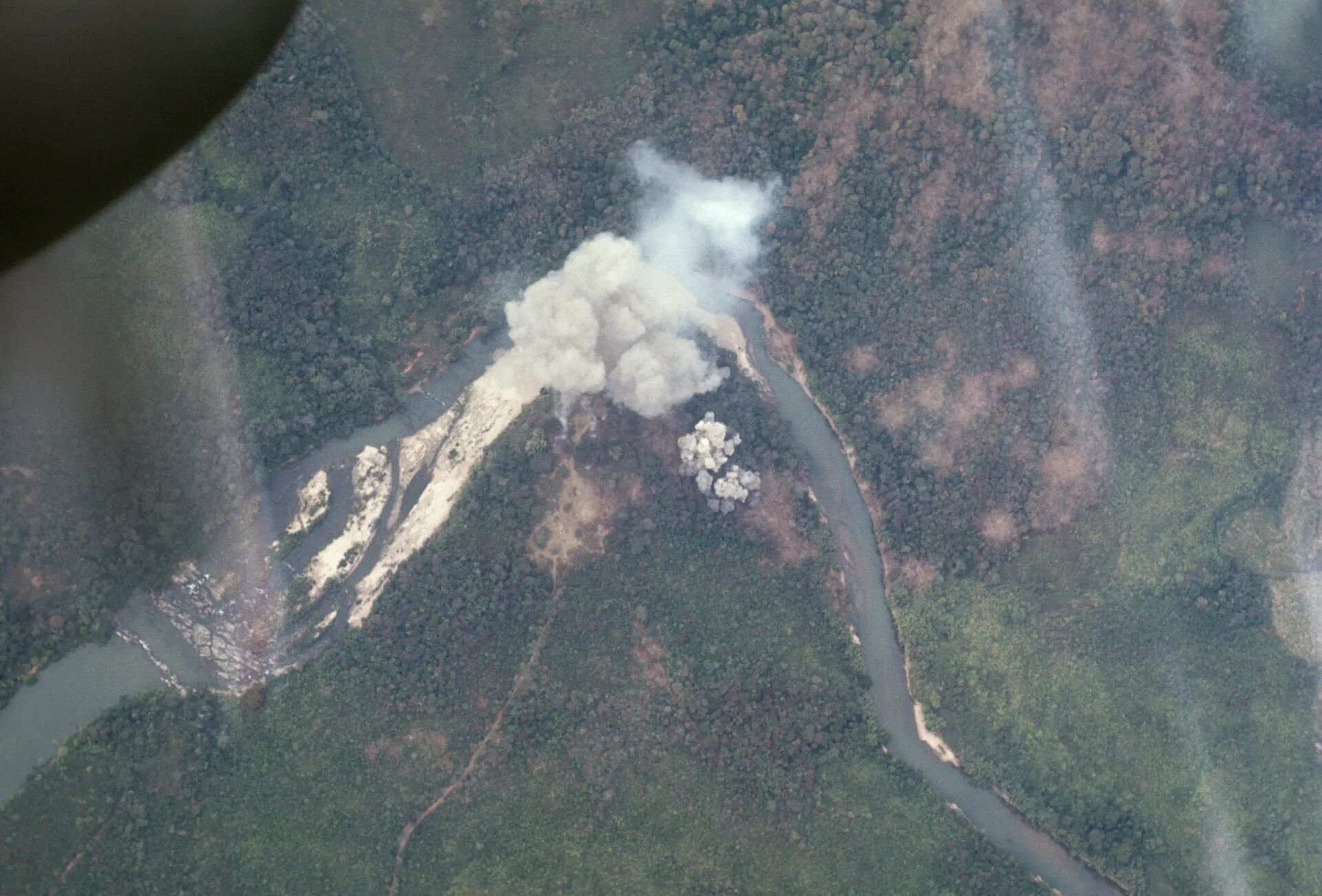 Aerial View of Bombing Strike on Jungle River Confluence