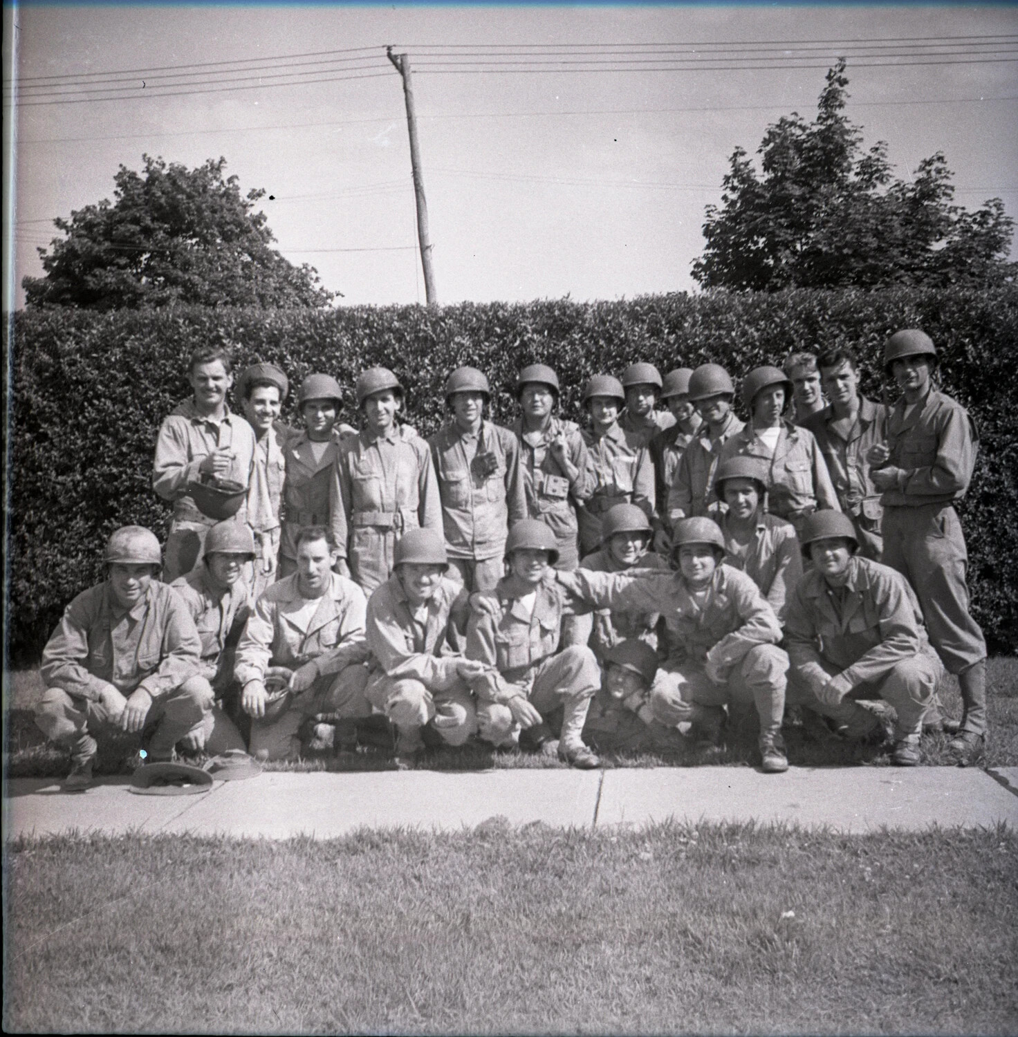 Group Portrait of Servicemen in Field Uniform and Helmets