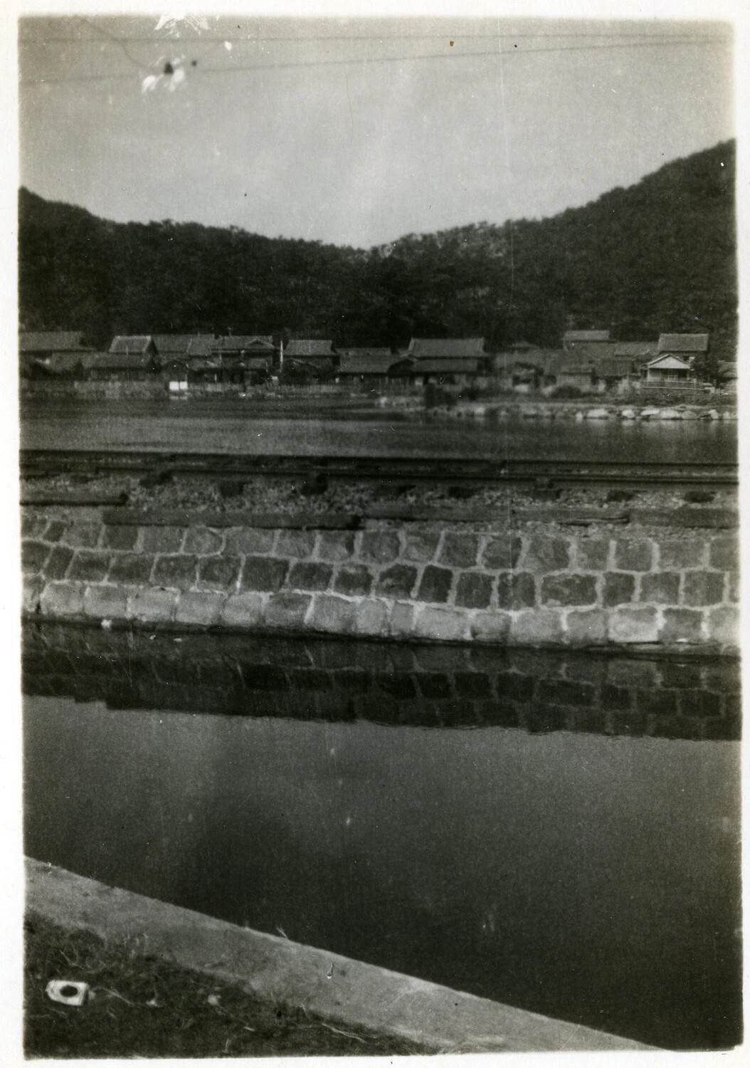 River Embankment and Village Rooftops, Occupied Japan, circa 1945-1946