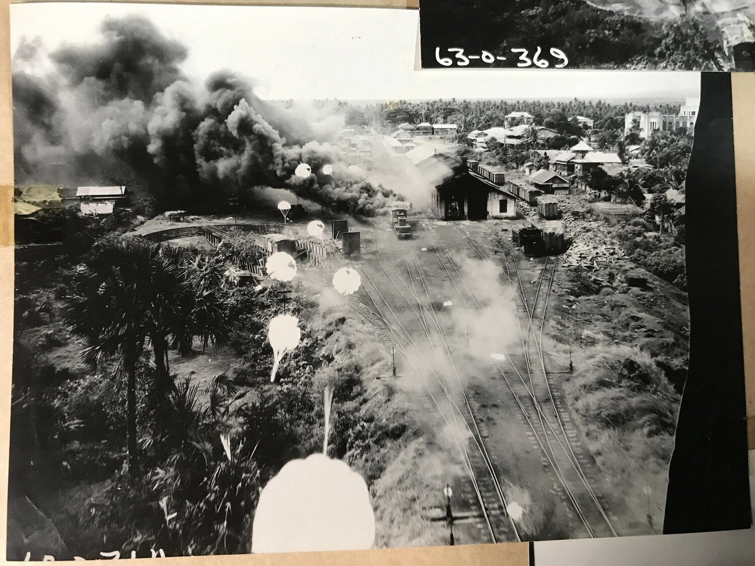 Album Page View of Rail Yard Strike Photograph with Archival Reference Numbers, Philippines, 312th Bomb Group