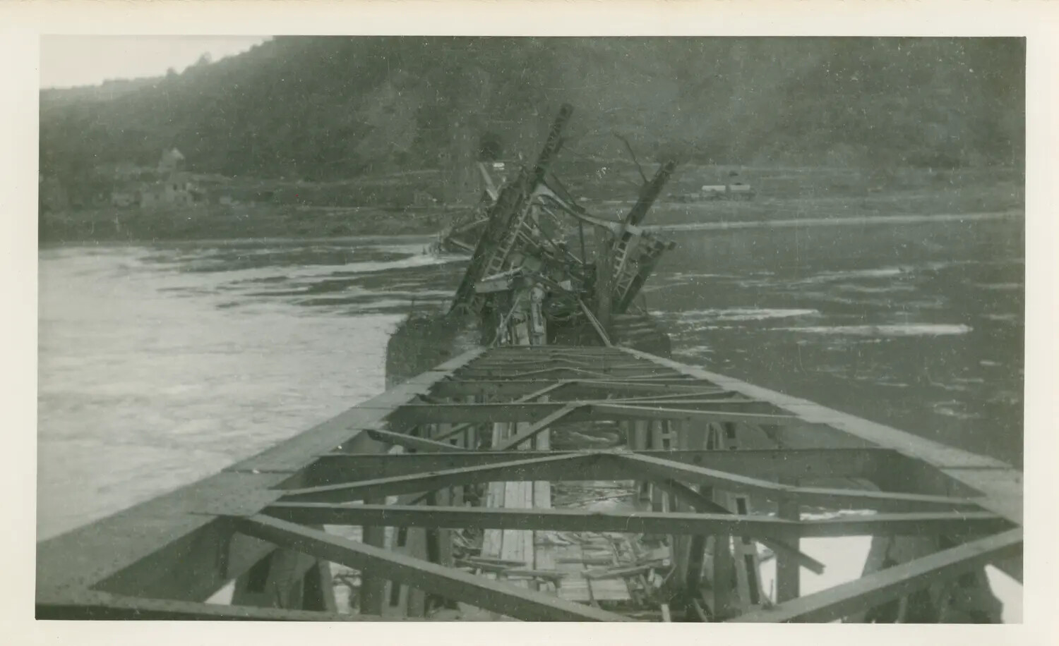Destroyed Steel Truss Bridge Spanning a River, European Theater, WWII