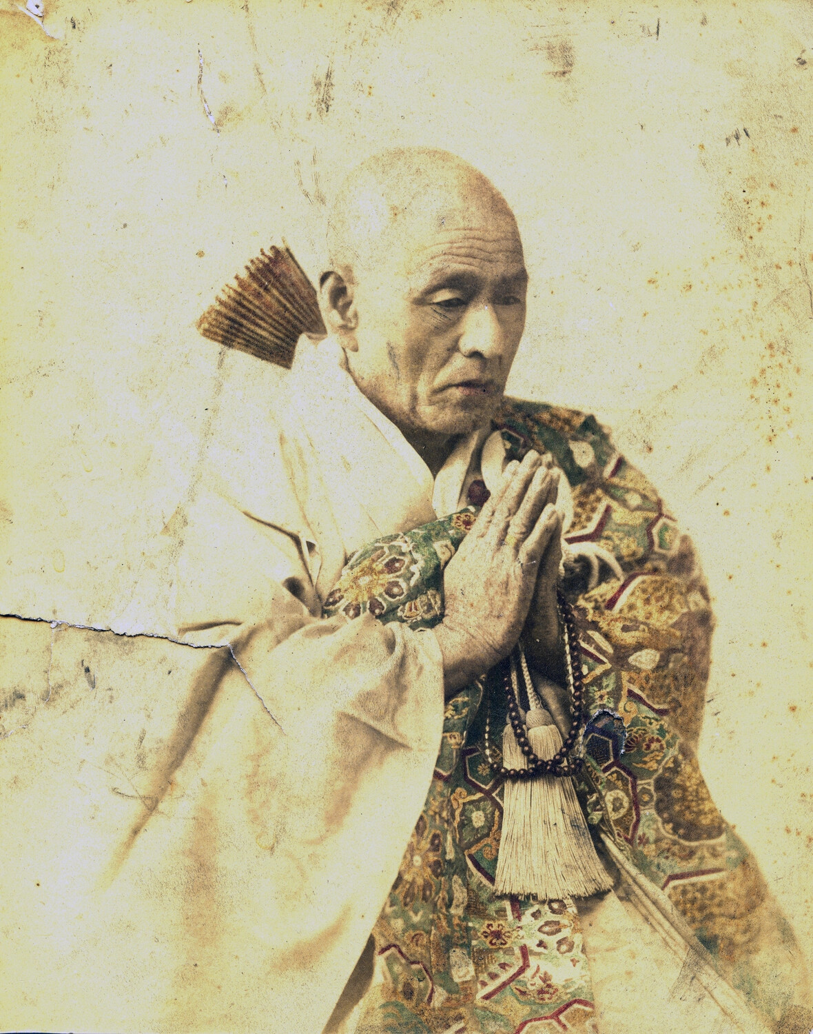 Hand-Tinted Portrait of a Buddhist Monk in Ceremonial Robes, Japan
