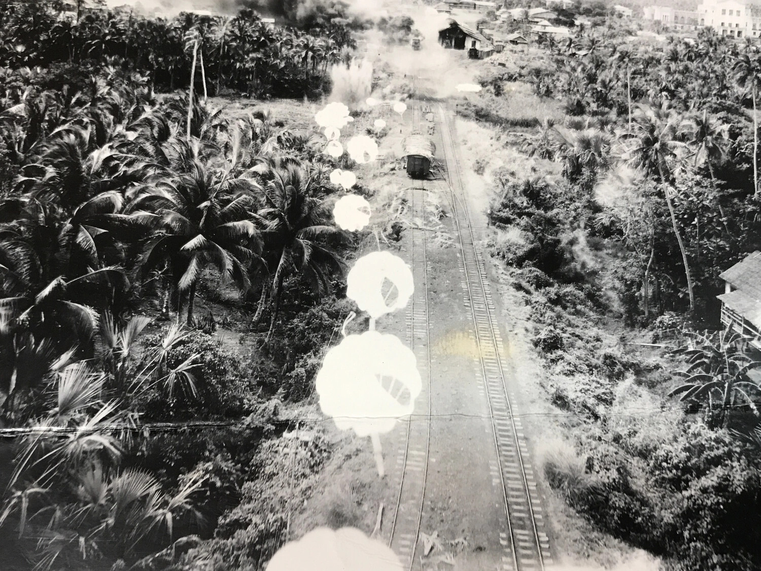 Low-Level Strike Photograph of Rail Line and Rolling Stock, Pacific Theater (312th Bomb Group)