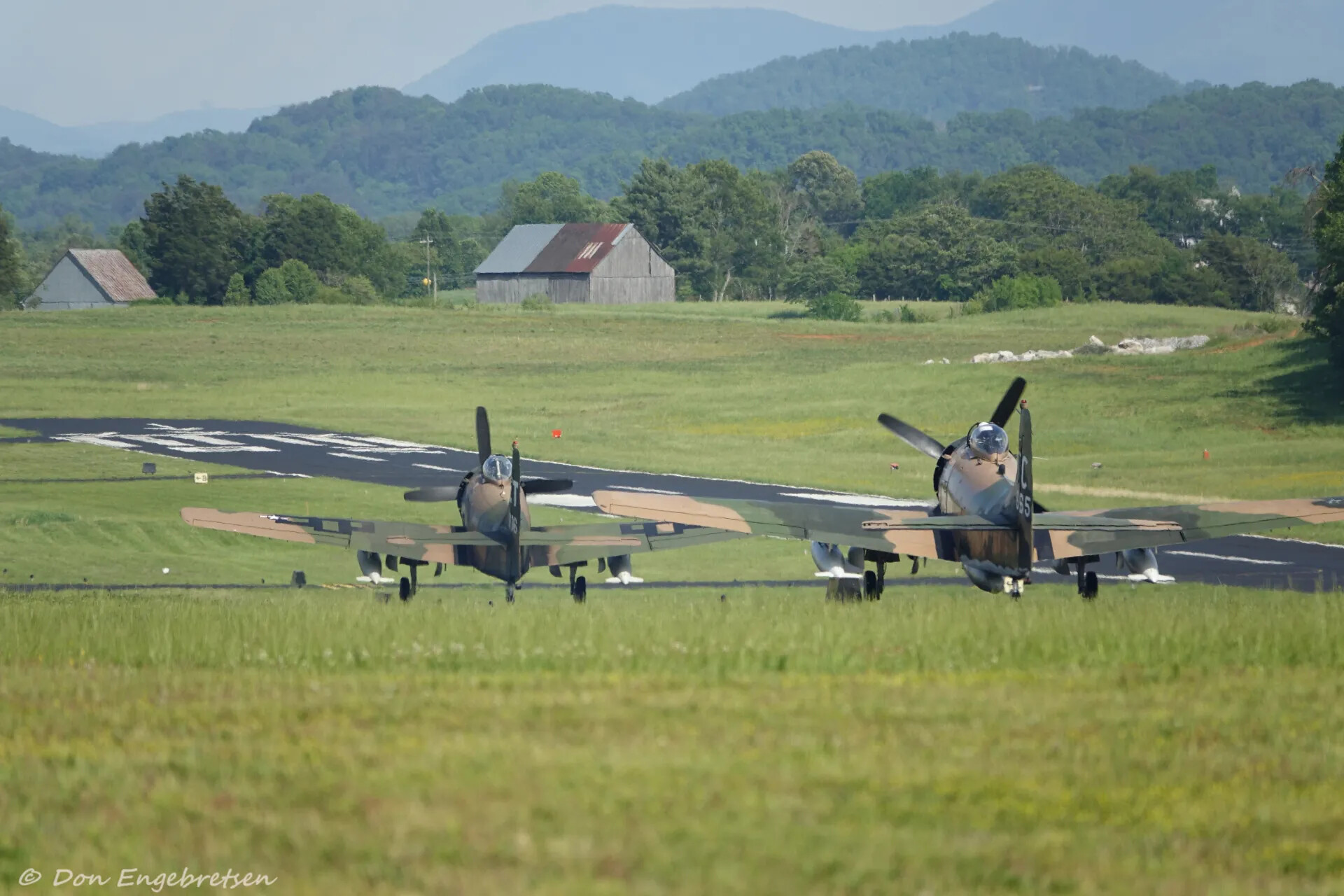 Two A-1 Skyraiders Taxiing at Rural Airfield, May 2019 Event (Don Engebretsen Photo)