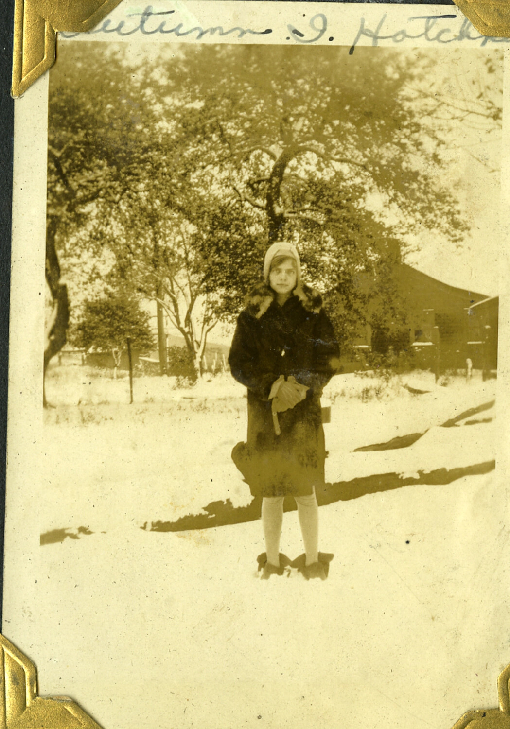 Girl in Winter Coat in Snow-Covered Field, Manila Photo Album
