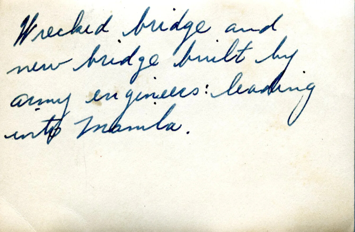Handwritten Album Caption: 'Wrecked Bridge and New Bridge Built by Army Engineers, Leading into Manila'