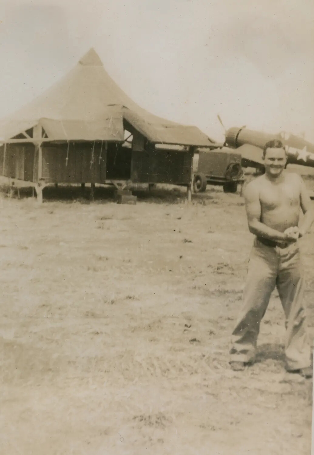 Serviceman at Pacific Theater Airfield Tent Camp, Edward P. McAleer Collection, WWII