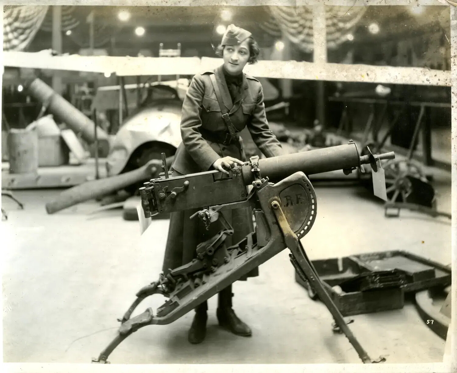 Woman in Military-Style Uniform with Vickers Machine Gun, WWI War-Trophy Exhibition, c. 1918-1919