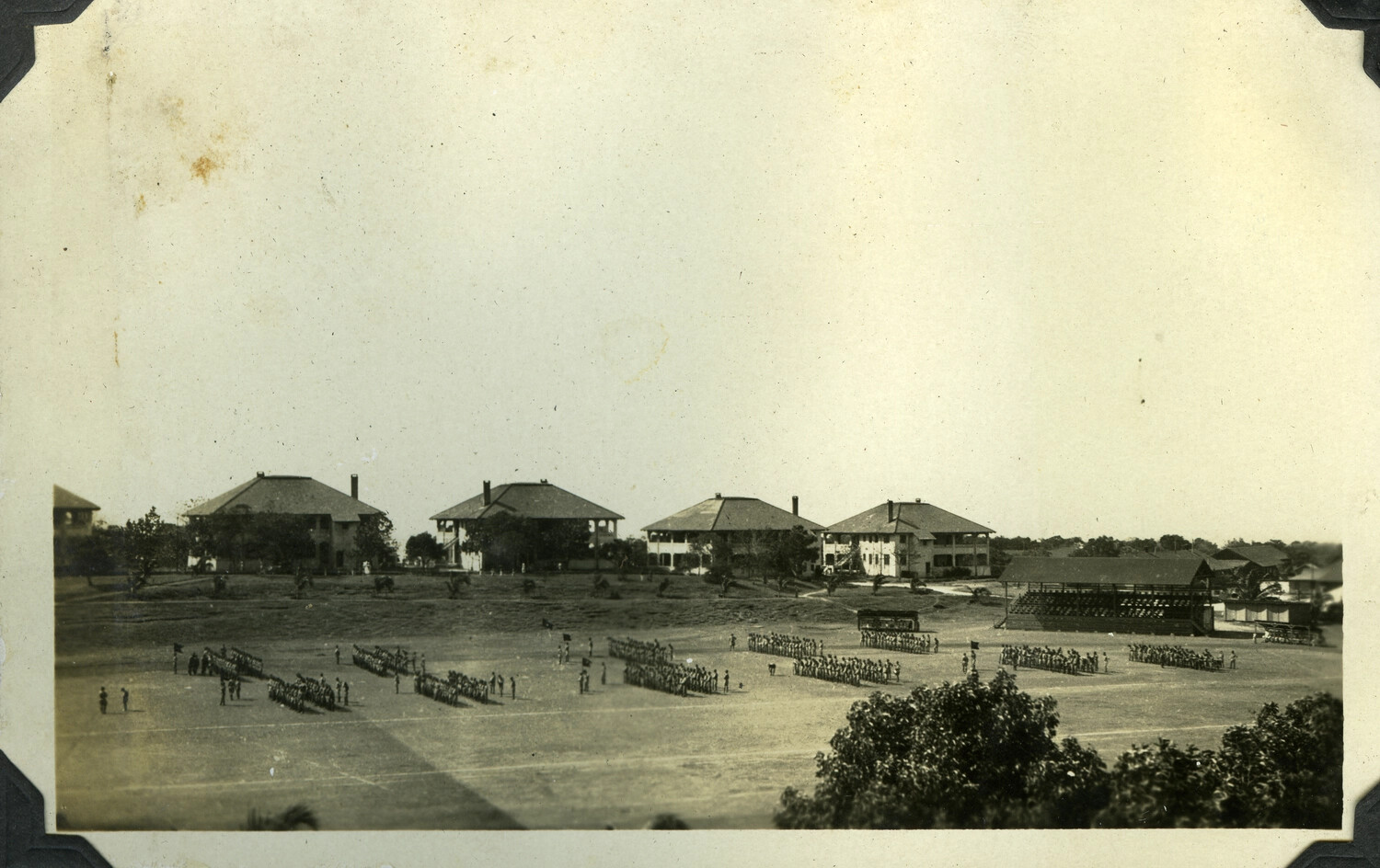 Multiple Company Formations on Parade Ground with Officers' Quarters and Grandstand, Manila Area, Philippines