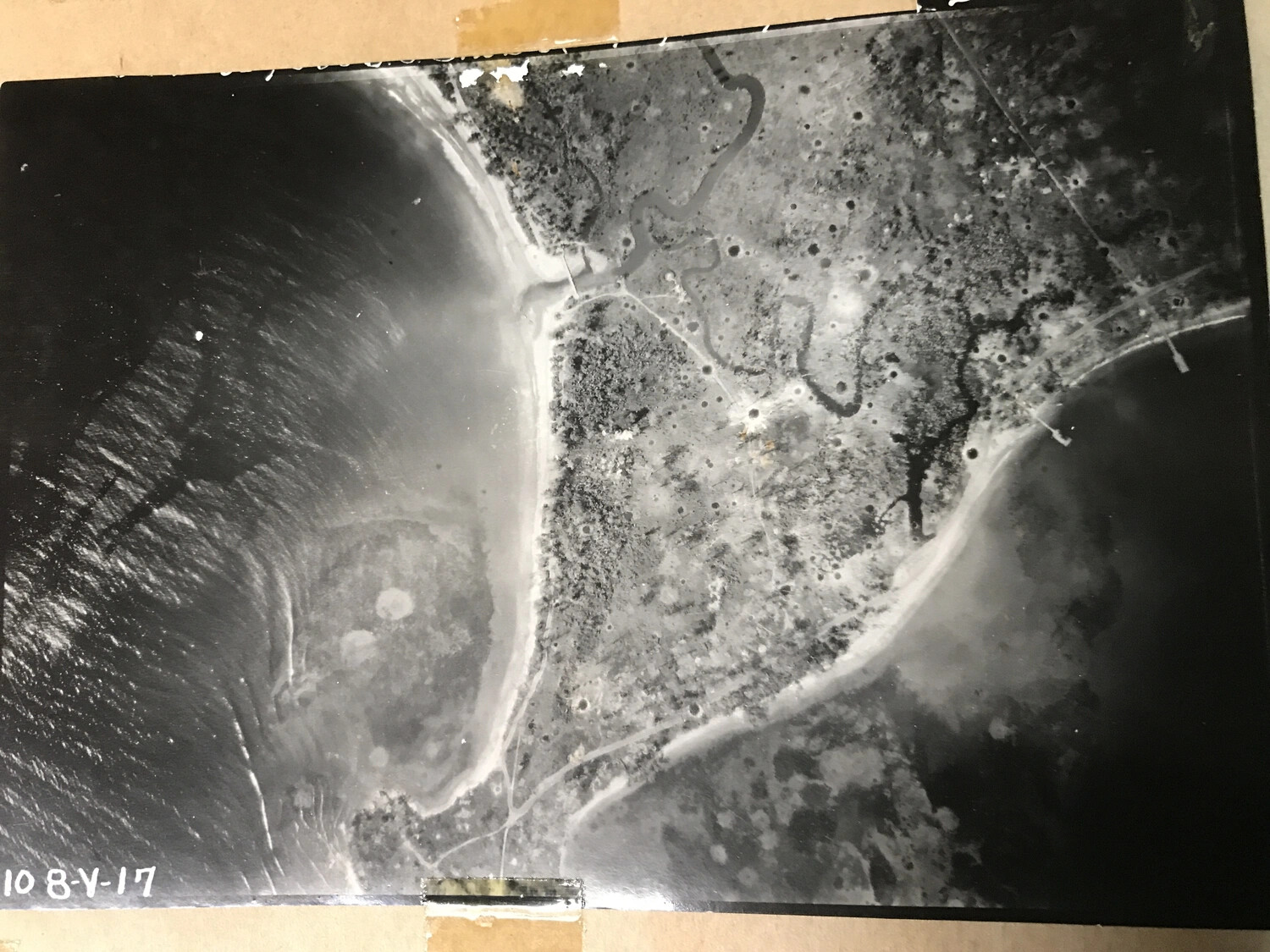 Vertical Aerial Reconnaissance Photograph of Cratered Coastal Airfield Area, Reference '10 8-V-17'