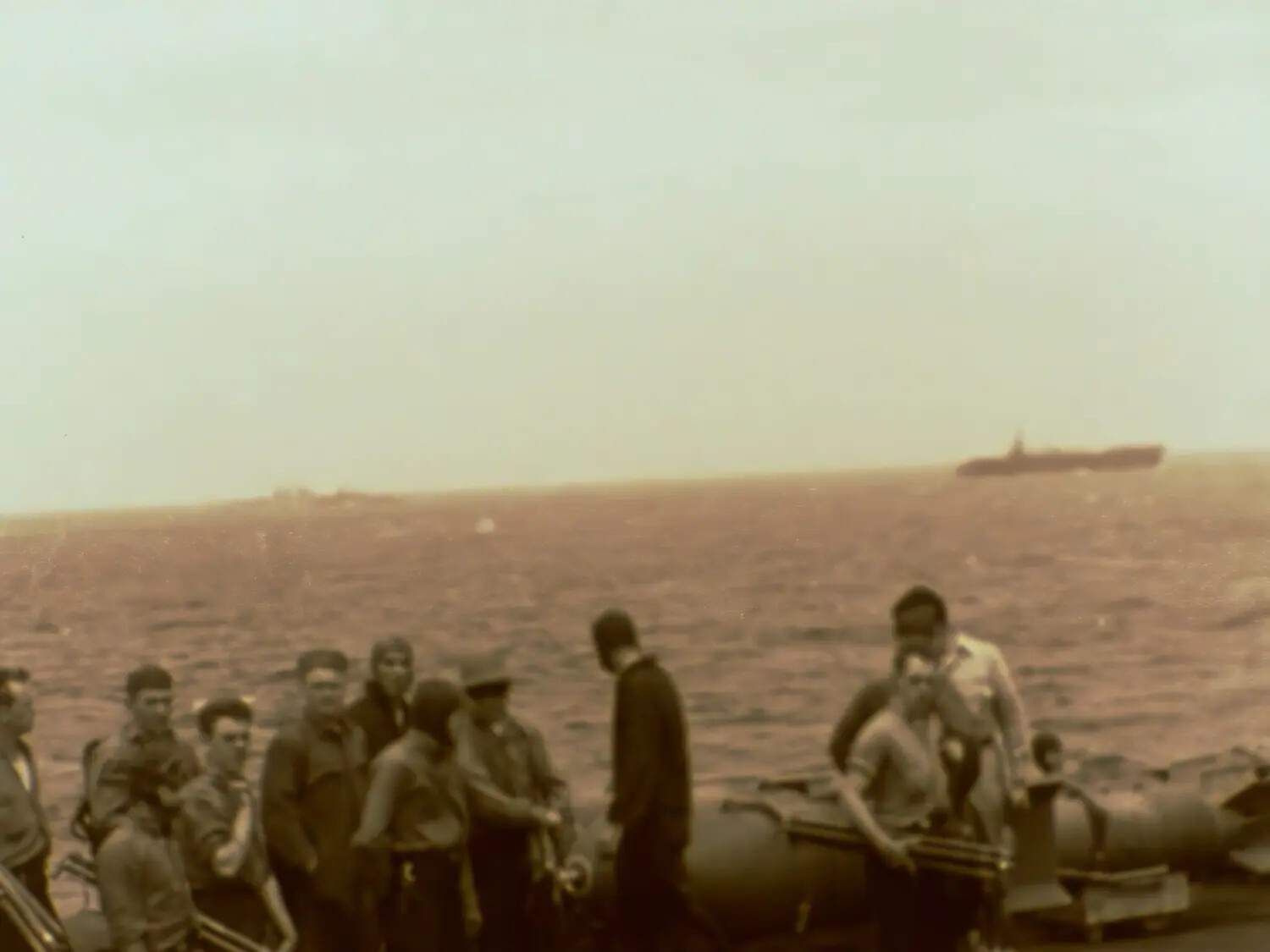 Sailors with Ordnance on Carrier Deck, Task Force Ship on Horizon, Ferry-Yamato Collection Film Still
