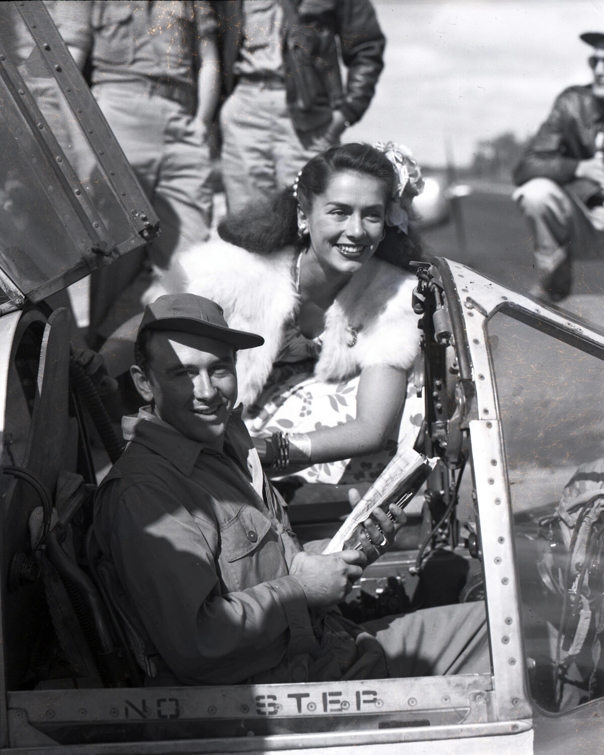 Woman and Pilot Posed on Fighter Aircraft Wing, China-Burma-India Theater, WWII