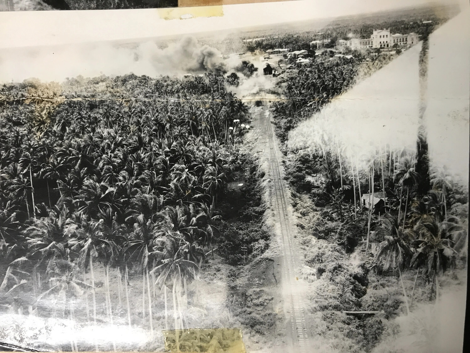 Album Page View of Aerial Strike Photograph, Railway Attack, Philippines, 312th Bomb Group