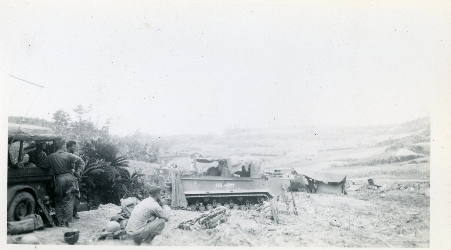 U.S. Army Tracked Vehicle and Jeep in Field Encampment, Likely Okinawa, 1945 (Third Sequential View)