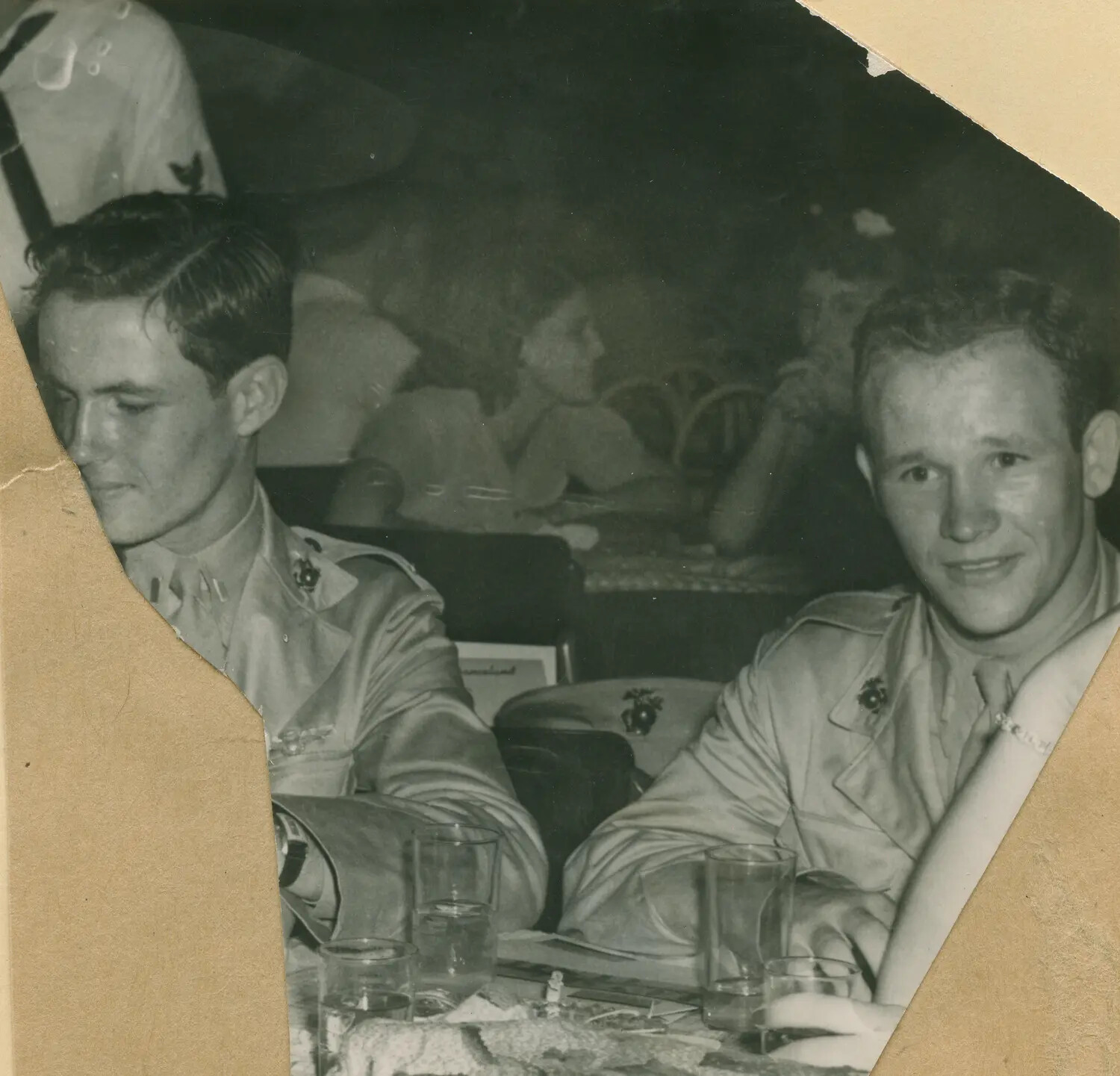 Two U.S. Marine Corps Servicemen at a Club or Restaurant Table (Torn Photograph, McAleer Collection)