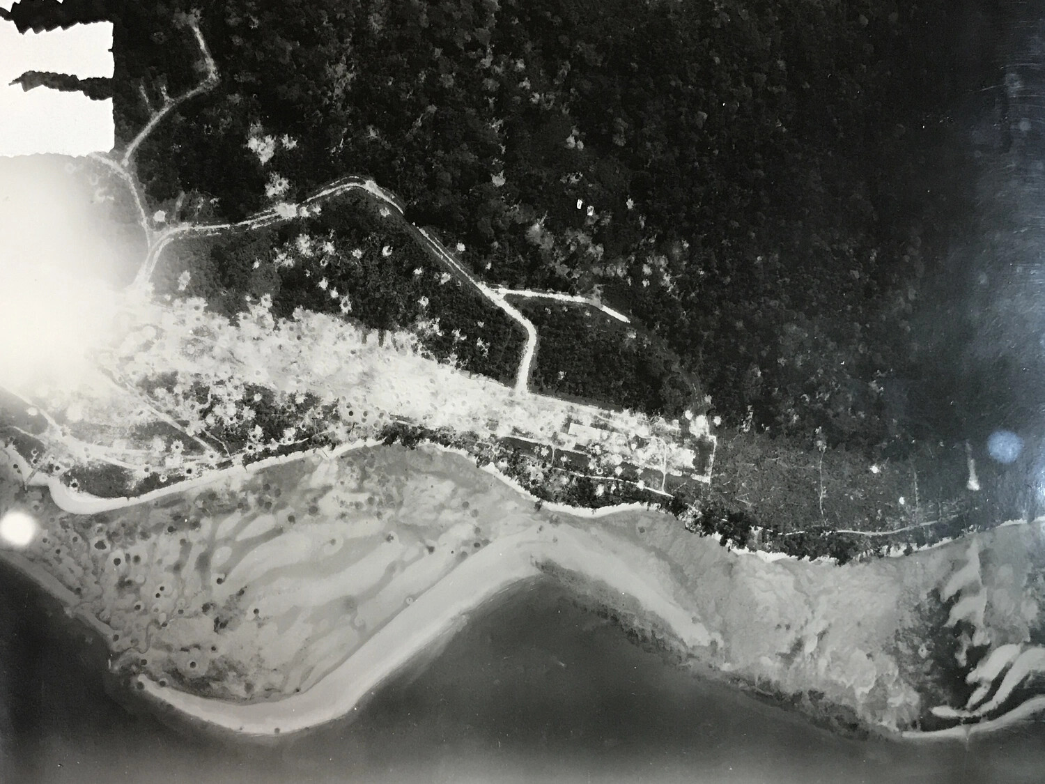 Vertical Reconnaissance Photograph of New Guinea Coastal Village and Jungle Terrain