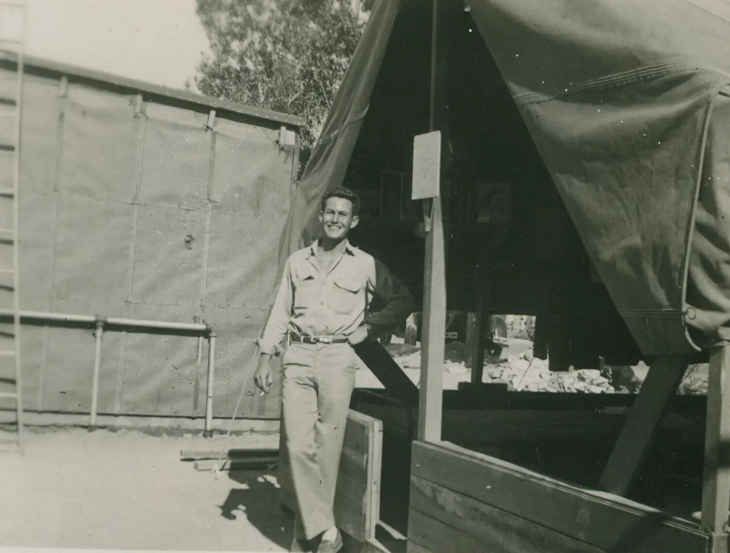 Serviceman Outside Tent Quarters, Edward P. McAleer Photo Album