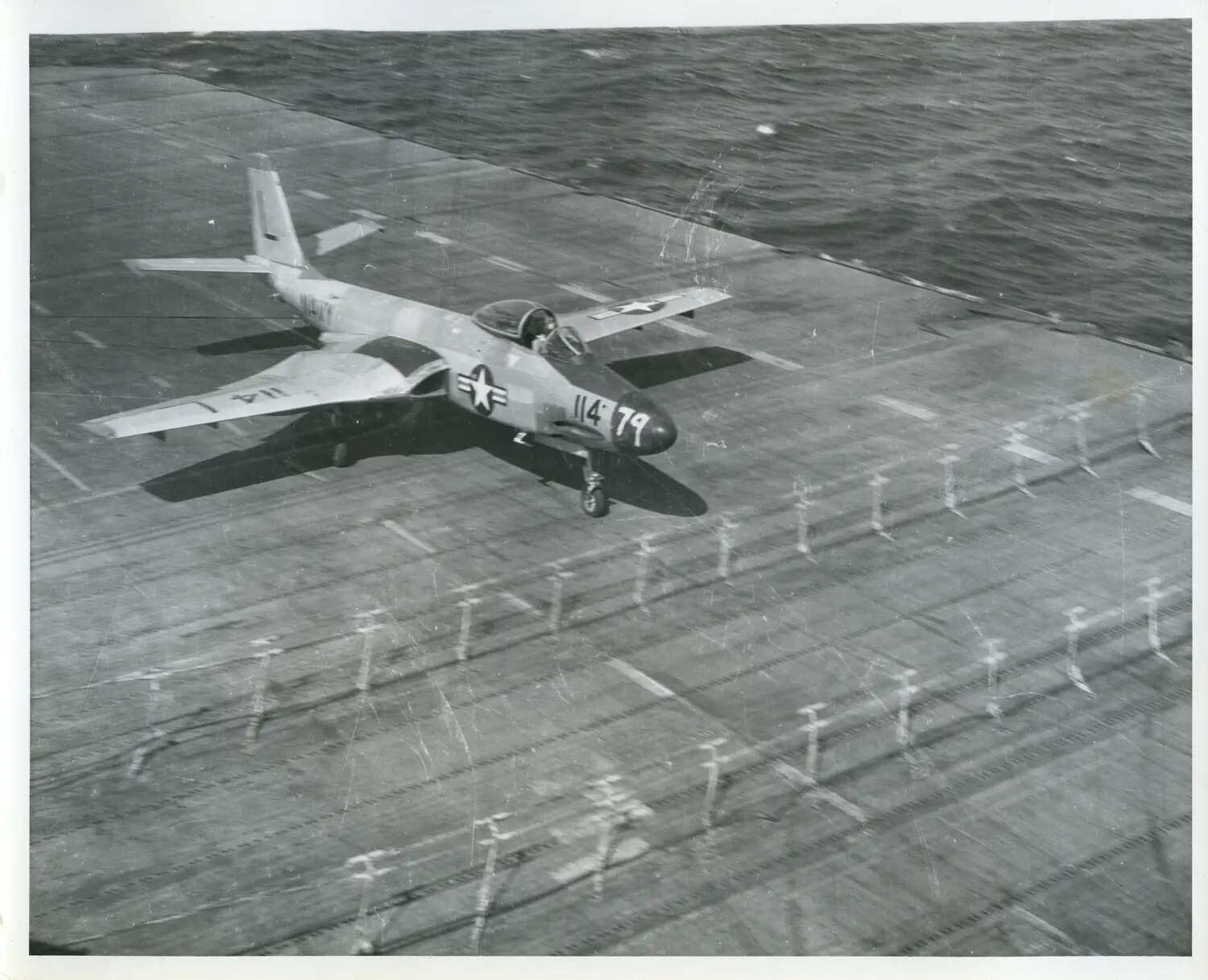 U.S. Navy Jet Fighter Approaching Carrier Deck