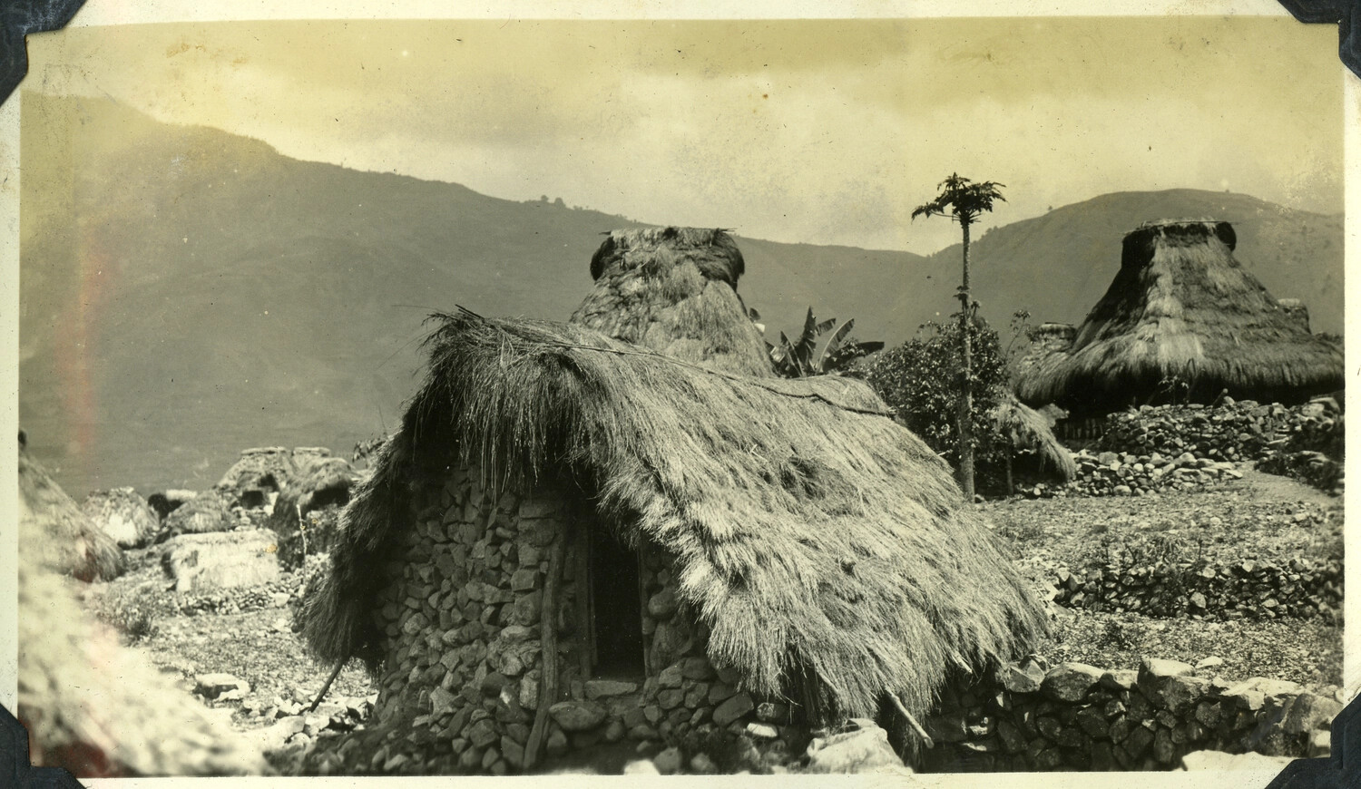 Traditional Stone and Thatch Dwellings in a Mountain Village, Manila Photo Album