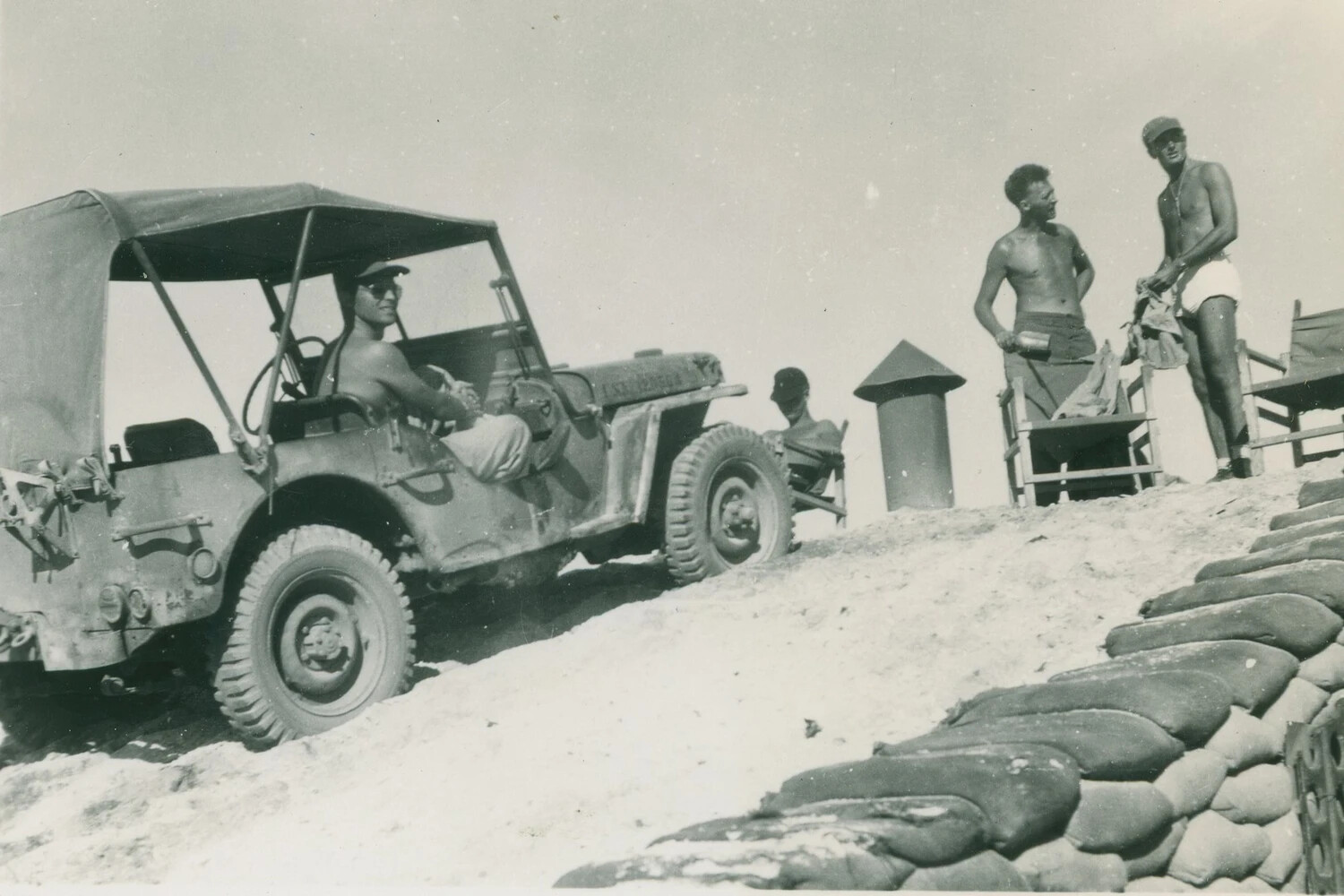 Military Jeep and Off-Duty Servicemen Near Sandbagged Bunker, Pat McAleer Collection